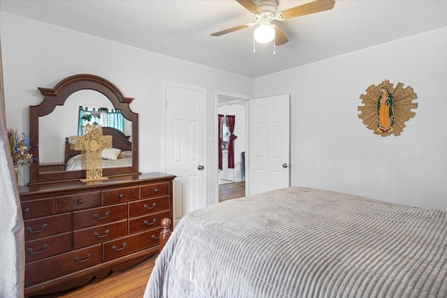 116 S Barron St, Arp, TX 75750 - bedroom with light wood finished floors and a ceiling fan