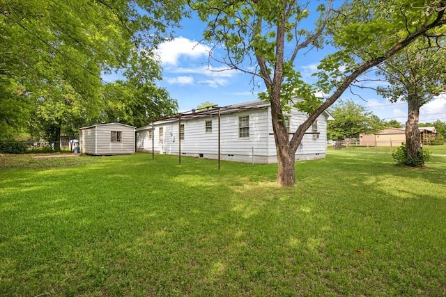 116 S Barron St, Arp, TX 75750 - view of yard with an outbuilding and a shed
