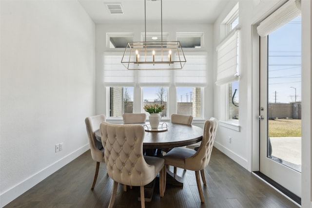 3411 Torrance Blvd, Frisco, TX 75034 - dining room featuring a chandelier, baseboards, and dark wood finished floors