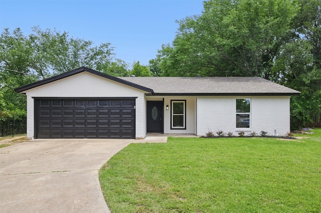 single story home with brick siding, a front yard, concrete driveway, a garage, and a shingled roof