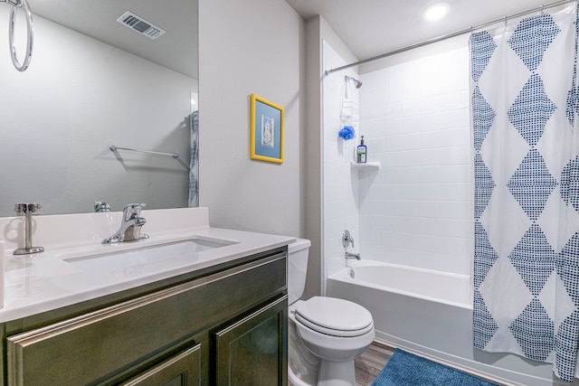 2358 Aylesbury Dr, Copperas Cove, TX 76522 - bathroom with shower / bath combo with shower curtain, toilet, vanity, and wood finished floors