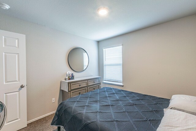 2358 Aylesbury Dr, Copperas Cove, TX 76522 - bedroom featuring dark carpet and baseboards
