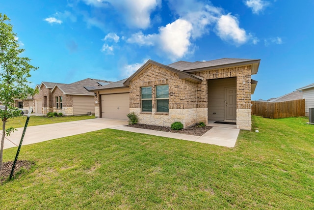 2358 Aylesbury Dr, Copperas Cove, TX 76522 - view of front of house with brick siding, concrete driveway, stone siding, and a garage