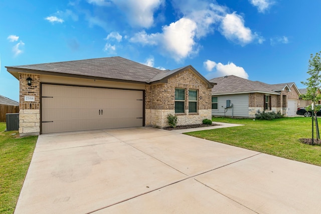 2358 Aylesbury Dr, Copperas Cove, TX 76522 - single story home featuring central AC, stone siding, a front yard, a garage, and concrete driveway