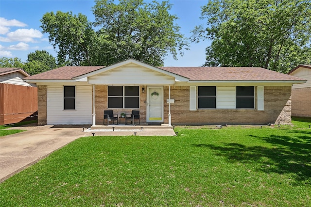 2433 Loyce Dr, Mesquite, TX 75149 - single story home with brick siding, a front lawn, a porch, and roof with shingles