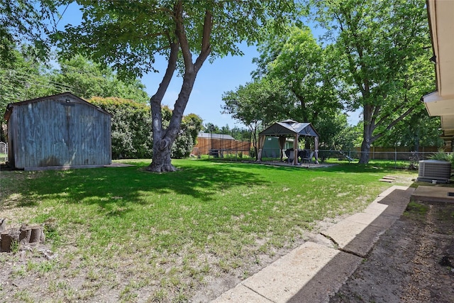 2433 Loyce Dr, Mesquite, TX 75149 - view of yard with a gazebo, a storage unit, central air condition unit, and an outbuilding