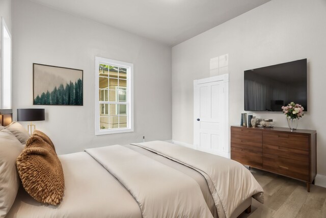 1315 E Pecan St, Gainesville, TX 76240 - bedroom featuring wood finished floors