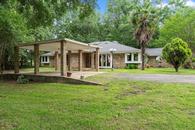3438 N US Highway 271, Mount Pleasant, TX 75455 - back of house featuring a yard
