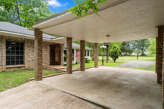3438 N US Highway 271, Mount Pleasant, TX 75455 - view of patio / terrace featuring a carport and driveway
