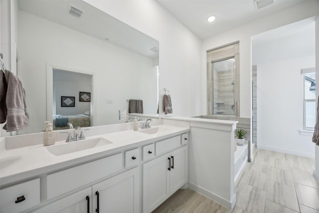 424 Somerville Dr, Mckinney, TX 75071 - full bath featuring ensuite bath, a shower stall, double vanity, and recessed lighting