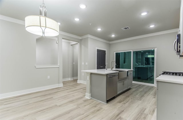 3325 Norris St, Plano, TX 75074 - kitchen featuring a sink, appliances with stainless steel finishes, light wood-type flooring, light countertops, and ornamental molding