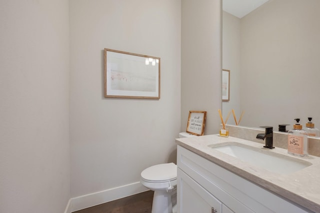 238 Estates Cir, College Station, TX 77840 - half bath featuring toilet, vanity, and baseboards