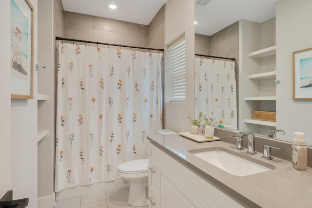 238 Estates Cir, College Station, TX 77840 - bathroom featuring toilet, tile patterned flooring, tiled shower, and vanity