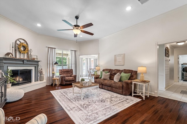 7622 Mary Ann Cir, Blanchard, LA 71107 - living area featuring ceiling fan, crown molding, wood finished floors, a brick fireplace, and recessed lighting