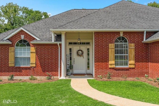 7622 Mary Ann Cir, Blanchard, LA 71107 - entrance to property with roof with shingles, brick siding, and a yard