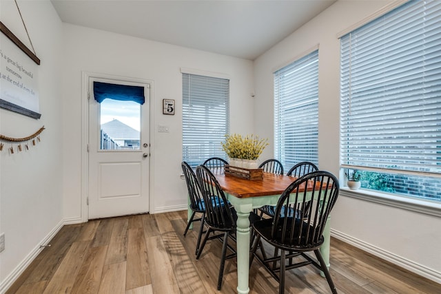 1252 Milfoil Dr, Justin, TX 76247 - dining area with wood finished floors and baseboards
