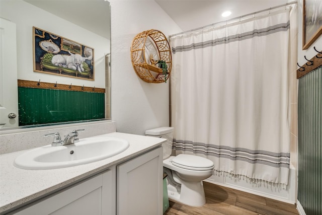 1252 Milfoil Dr, Justin, TX 76247 - full bath featuring wood finished floors, toilet, and vanity