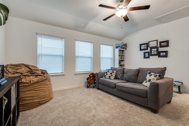 1252 Milfoil Dr, Justin, TX 76247 - carpeted living area featuring attic access, a ceiling fan, baseboards, and lofted ceiling
