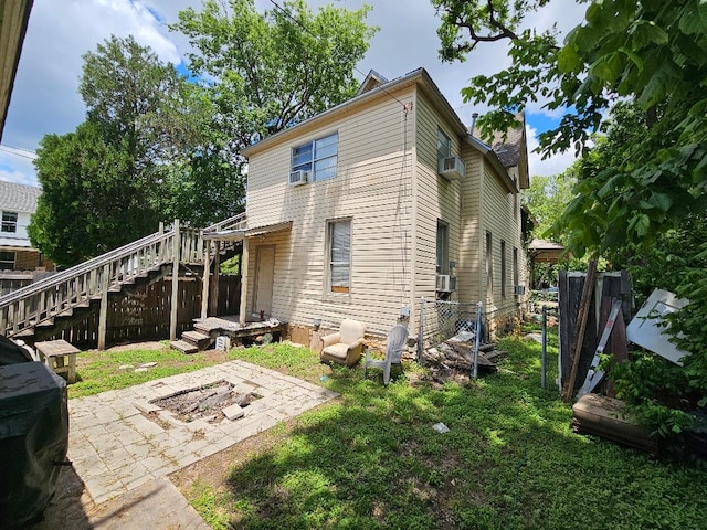 1801 S 10th St S Unit A & B, Waco, TX 76706 - rear view of house featuring stairs, fence, a patio area, a chimney, and an AC wall unit