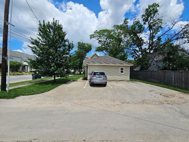 1801 S 10th St S Unit A & B, Waco, TX 76706 - garage with fence and uncovered parking