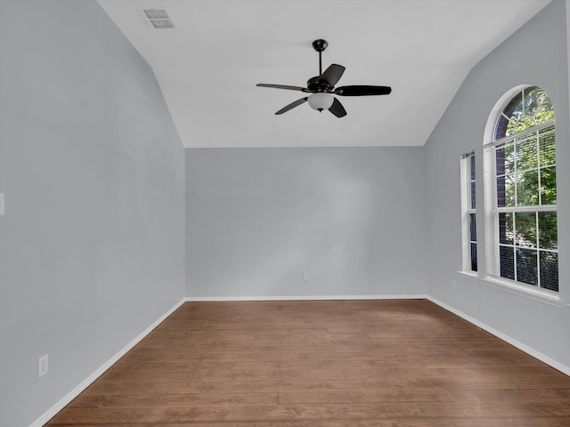 3236 Yeltes, Grand Prairie, TX 75054 - empty room featuring vaulted ceiling, ceiling fan, wood finished floors, and baseboards
