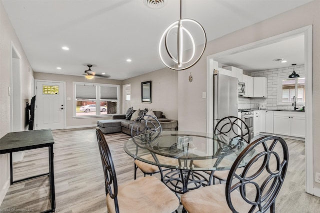 1701 W College St, Sherman, TX 75092 - dining area featuring light wood-type flooring, a ceiling fan, recessed lighting, and baseboards