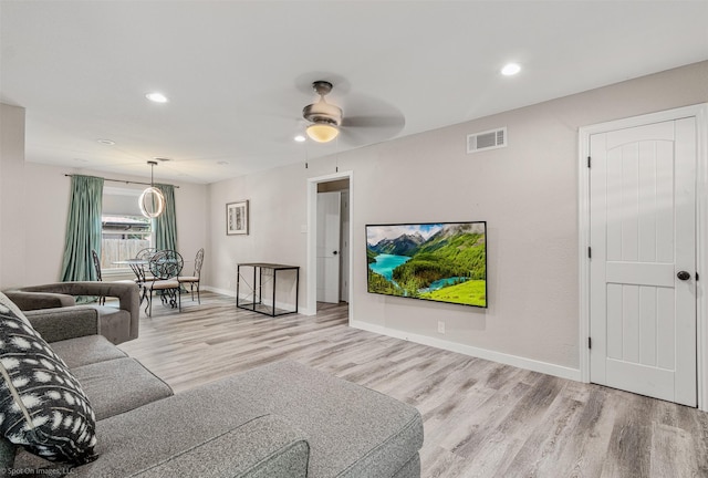 1701 W College St, Sherman, TX 75092 - living room featuring wood finished floors, baseboards, recessed lighting, and a ceiling fan