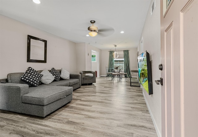 1701 W College St, Sherman, TX 75092 - living area with light wood-style floors, recessed lighting, ceiling fan, and baseboards