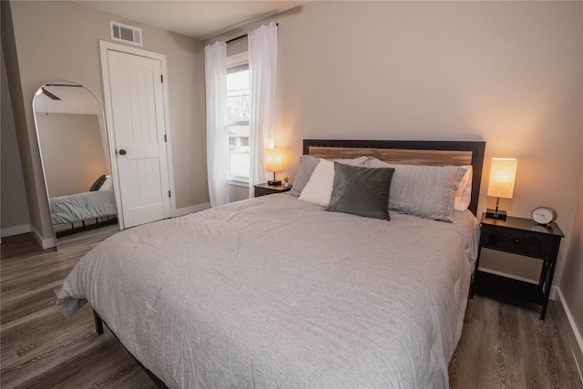 1701 W College St, Sherman, TX 75092 - bedroom with wood finished floors and baseboards