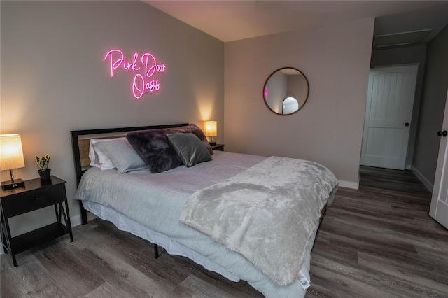 1701 W College St, Sherman, TX 75092 - bedroom featuring wood finished floors and baseboards