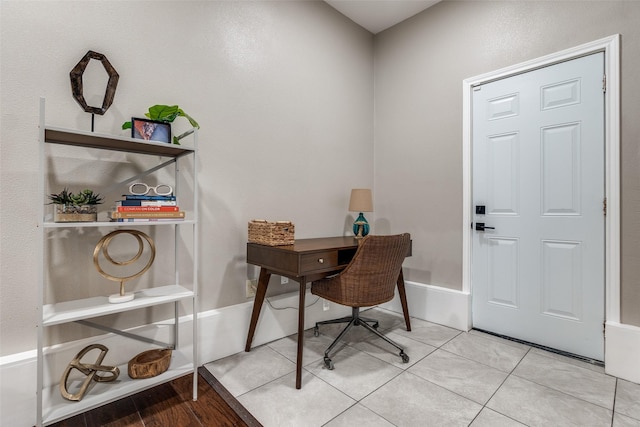 2839 Ruidosa Ave, Dallas, TX 75228 - home office with baseboards and light tile patterned flooring