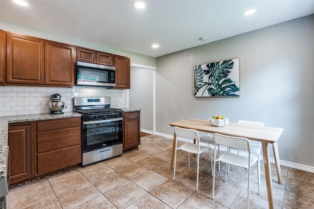 2839 Ruidosa Ave, Dallas, TX 75228 - kitchen featuring appliances with stainless steel finishes, backsplash, baseboards, light stone counters, and recessed lighting