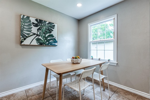 2839 Ruidosa Ave, Dallas, TX 75228 - dining area featuring baseboards and tile patterned floors