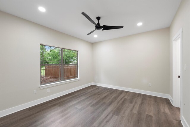 600 Arthur St, Mcgregor, TX 76657 - spare room with dark wood finished floors, ceiling fan, recessed lighting, and baseboards