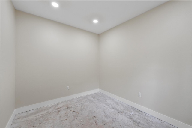 600 Arthur St, Mcgregor, TX 76657 - empty room featuring concrete floors, recessed lighting, and baseboards