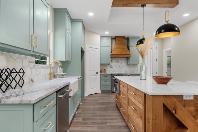 600 Arthur St, Mcgregor, TX 76657 - kitchen featuring premium range hood, dark wood finished floors, stainless steel appliances, tasteful backsplash, and green cabinetry