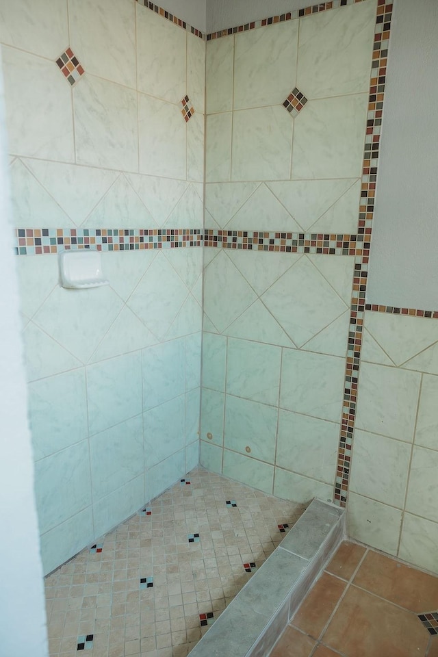 bathroom featuring a stall shower and tile patterned floors