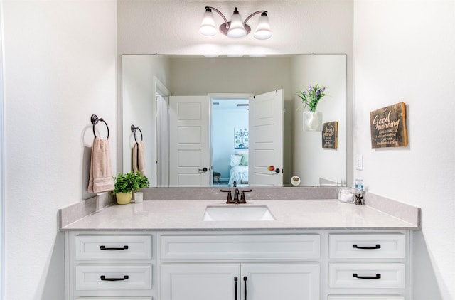 6108 Lipan Ln, Mckinney, TX 75070 - bathroom with vanity and connected bathroom