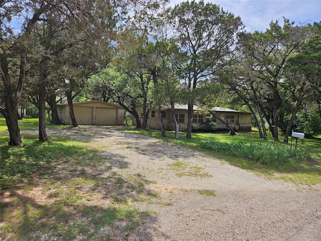 193 County Road 1704, Clifton, TX 76634 - view of front of house featuring a garage and an outdoor structure