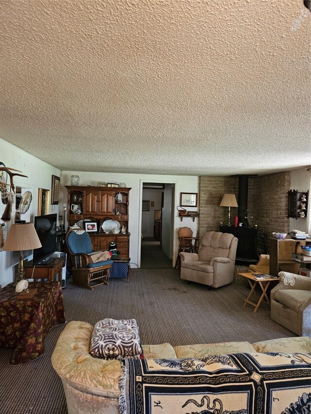 193 County Road 1704, Clifton, TX 76634 - living area with a chandelier, carpet flooring, and a textured ceiling