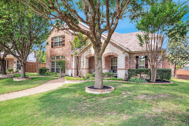 8001 Sutherland Ln, Plano, TX 75025 - view of front of house with brick siding, roof with shingles, and stone siding