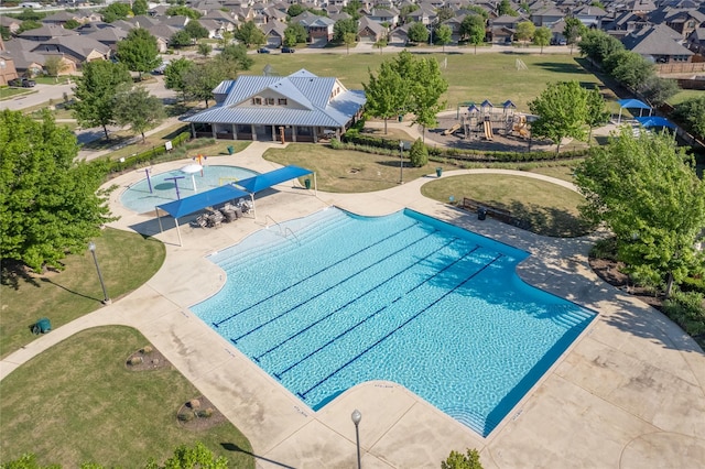 9332 Castorian Dr, Fort Worth, TX 76131 - community pool with a residential view, a yard, and a patio area