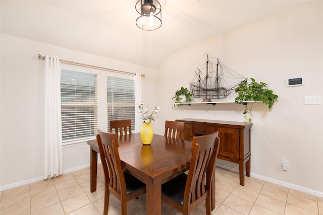 9332 Castorian Dr, Fort Worth, TX 76131 - dining space featuring lofted ceiling, baseboards, and light tile patterned floors