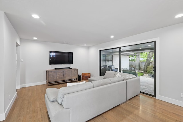 11641 Sasanqua Ln, Dallas, TX 75218 - living room featuring light wood-type flooring, baseboards, and recessed lighting