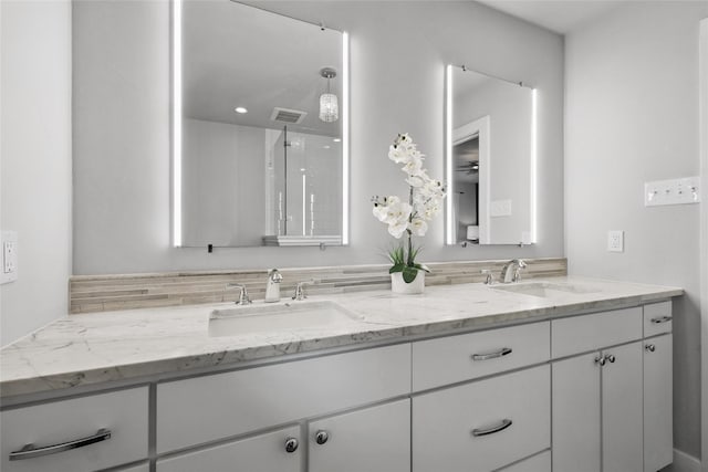 11641 Sasanqua Ln, Dallas, TX 75218 - bathroom featuring double vanity and a shower