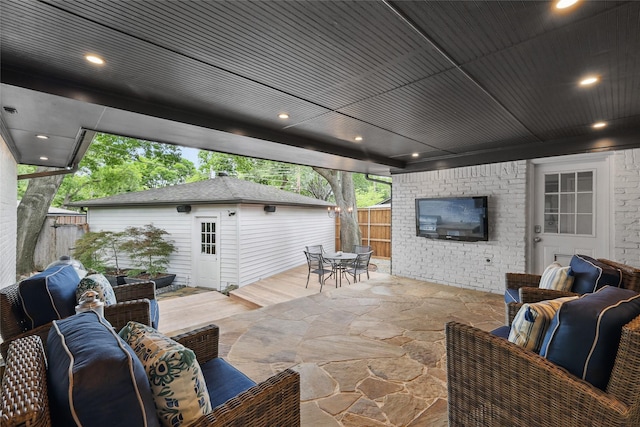 11641 Sasanqua Ln, Dallas, TX 75218 - view of patio / terrace with outdoor lounge area, fence, outdoor dining area, an outbuilding, and a deck