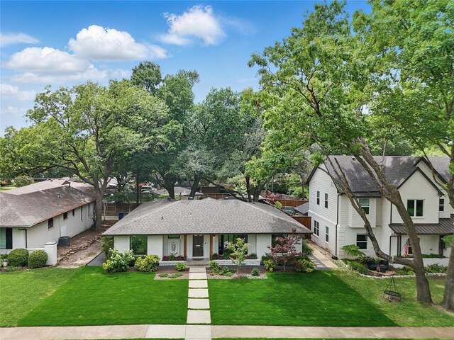 11641 Sasanqua Ln, Dallas, TX 75218 - view of front of property featuring a front lawn, a residential view, covered porch, and stucco siding