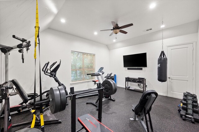 exercise room featuring a ceiling fan, recessed lighting, and vaulted ceiling