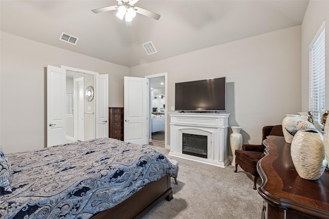 810 Brenda Dr, Mansfield, TX 76063 - bedroom with carpet floors, a glass covered fireplace, ceiling fan, and connected bathroom