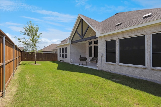 810 Brenda Dr, Mansfield, TX 76063 - back of property featuring roof with shingles, a patio, and brick siding